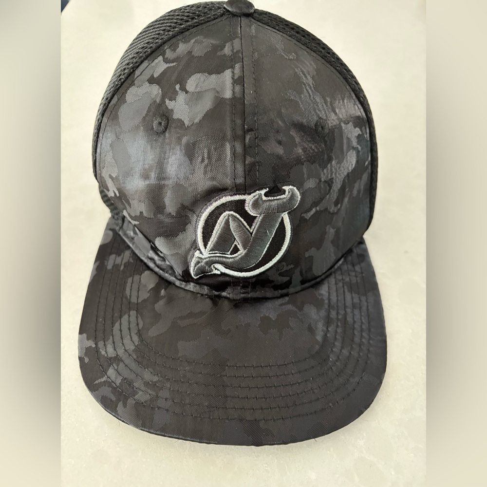 NHL NJ Devils black camo baseball cap.
